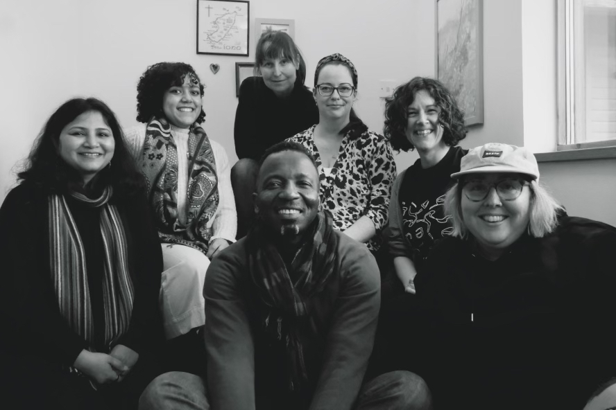 A black and white photograph of our CULTIVATE creative practitioners and our Creative Climate Producer, Claire.